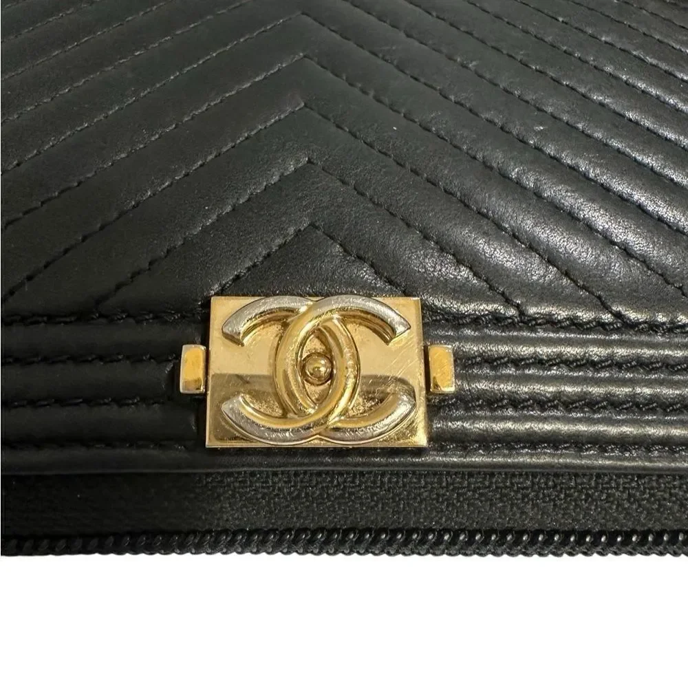 Chanel Black and Gold Quilted Clutch